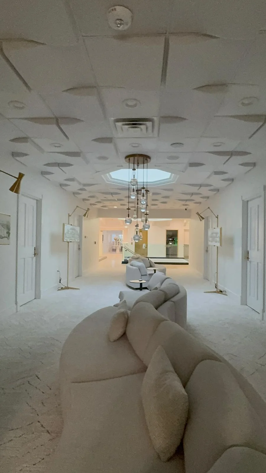 Commercial lobby with carpet and upholstered seating